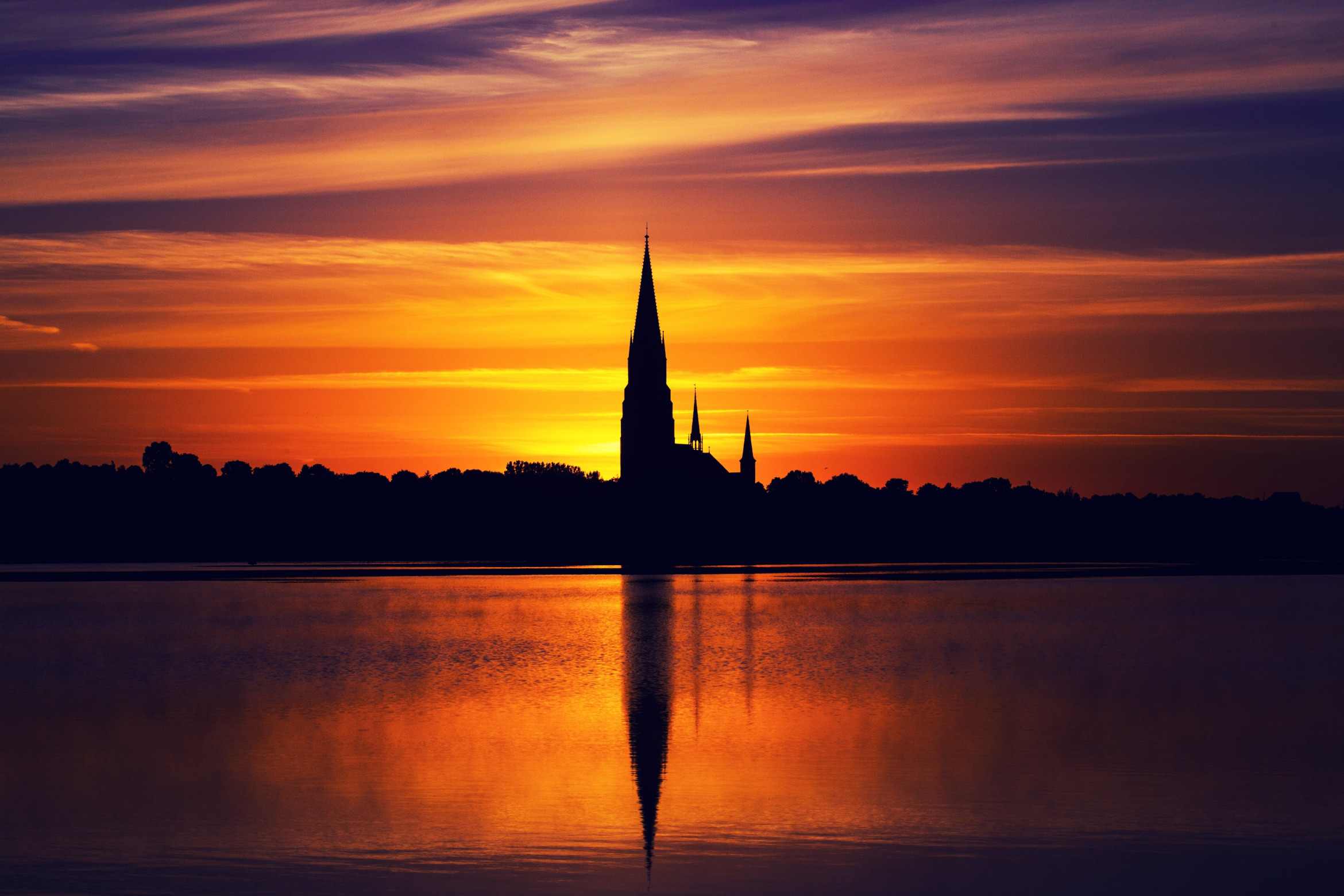 Schlei mit Dom Schleswig bei Sonnenuntergang; Detektei Schleswig, Detektiv Schleswig, Privatdetektiv Schleswig, Privatdetektei Schleswig